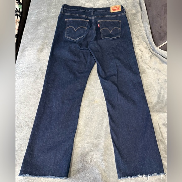 Levi's Slimming Slim Raw Hem Dark Jeans - Picture 5 of 8